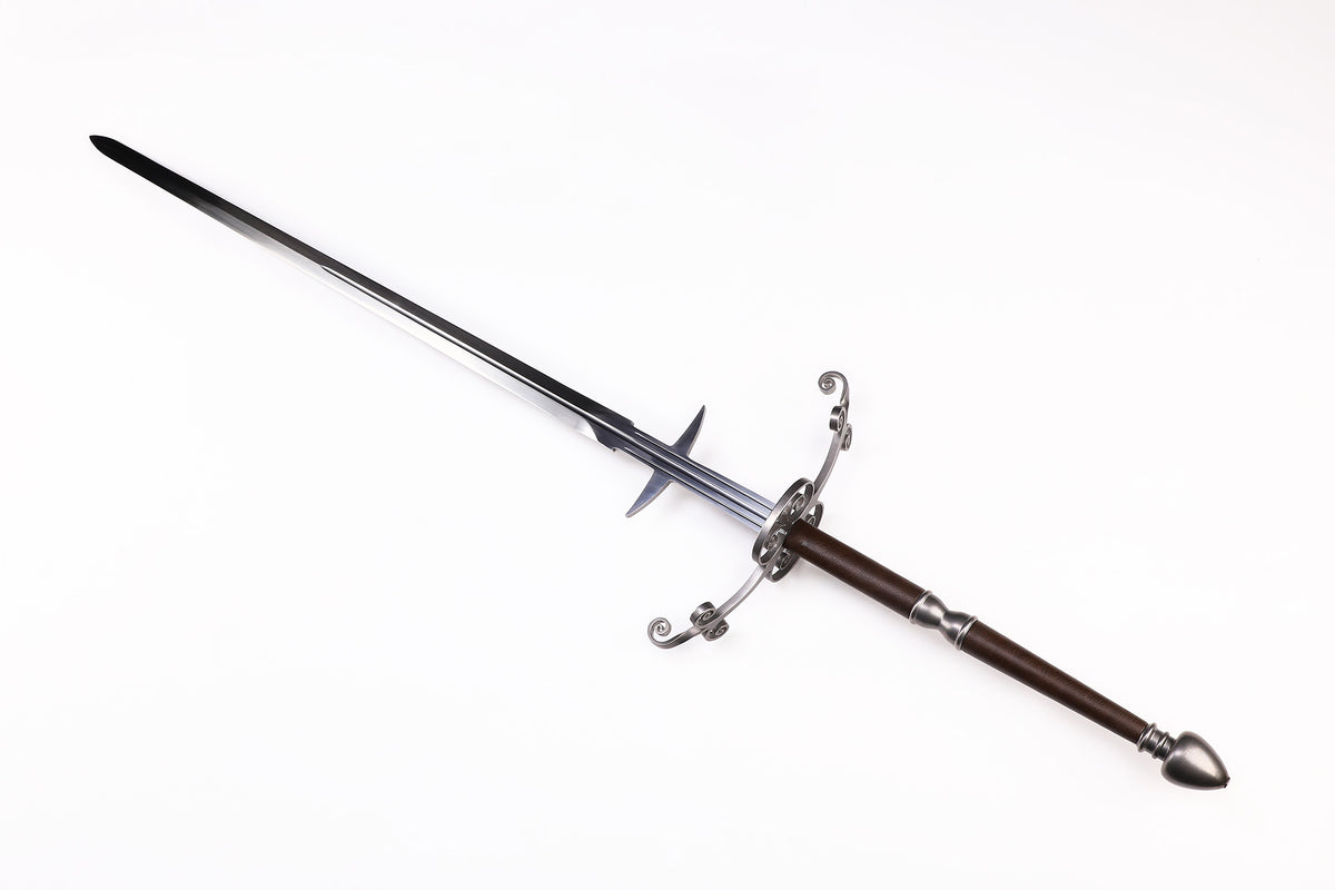 Renaissance European greatsword angled view - blade curvature and scroll wing crossguard