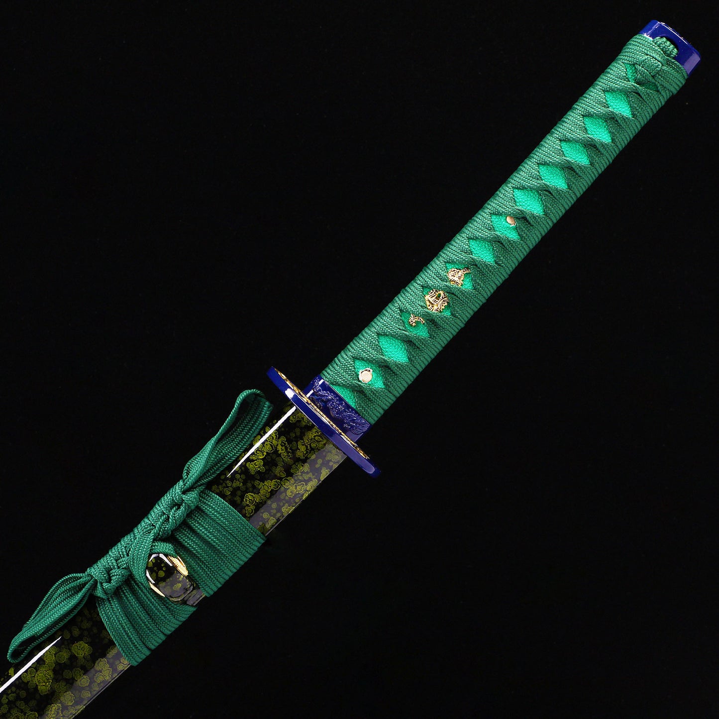 Blue Green Dragon katana handle close-up - teal tsuka wrap with dragon design
