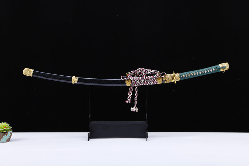 Green handle hand forged katana saya close-up - scabbard and koiguchi detail