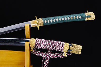 Green handle hand forged katana handle close-up - green tsuka wrap with ito binding