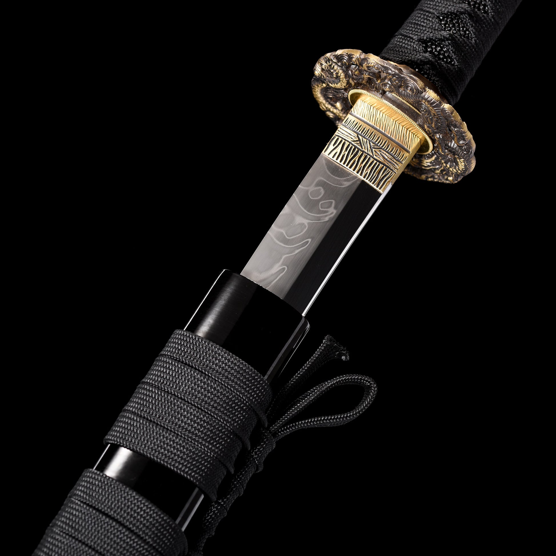 T10 steel katana hamon close-up - clay tempered wavy temper line detail