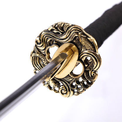 Koi fish engraved katana tsuba close-up - hand engraved koi carp motif guard detail