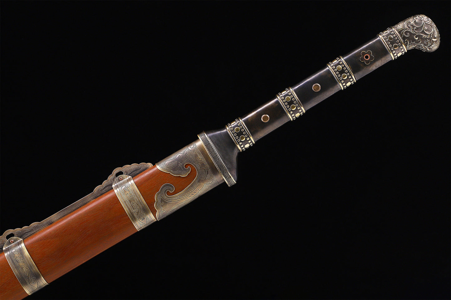 Dragon phoenix Chinese sword guard close-up - cloud engraved copper guard detail