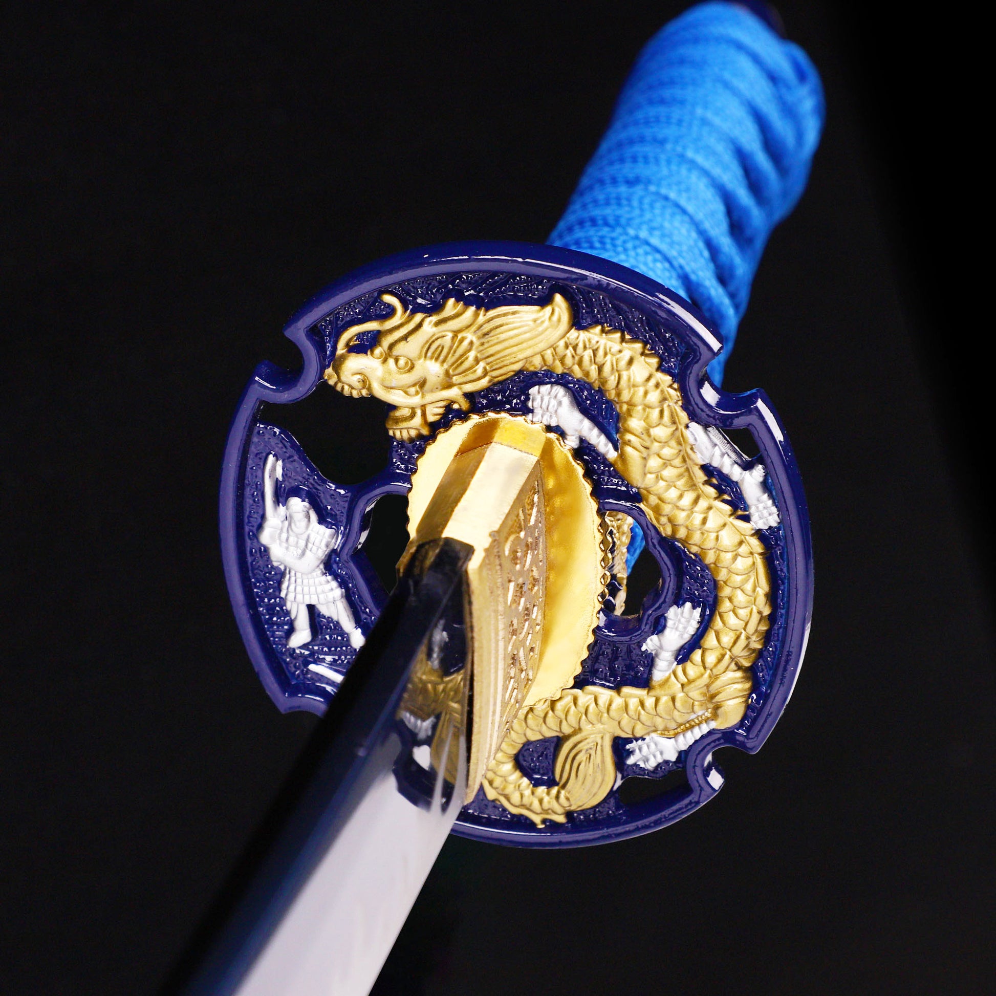 Blue blade wave pattern tanto tsuba close-up - wave motif hand guard and habaki detail