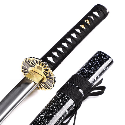 Chrysanthemum openwork katana tsuba close-up - pierced floral hand guard detail
