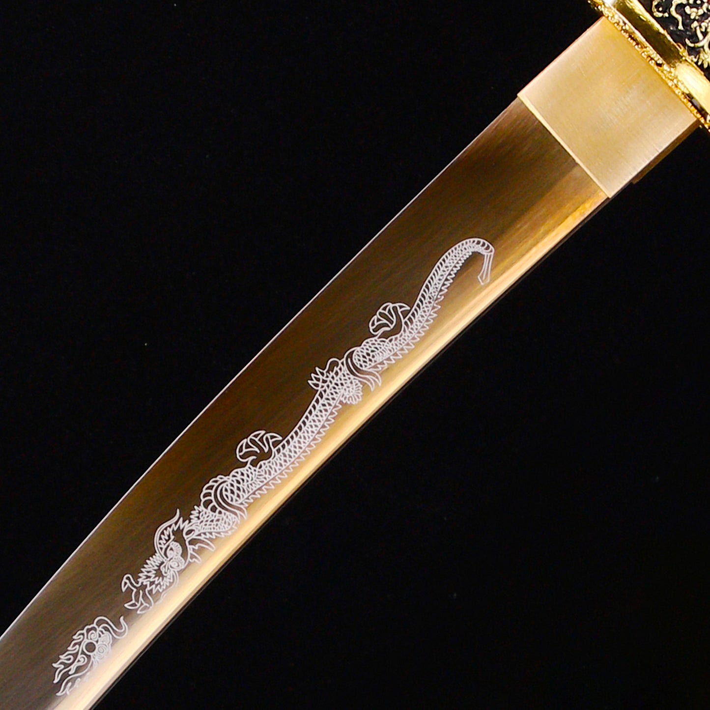 Gold handle saya tanto blade close-up - razor sharp steel edge and hamon detail