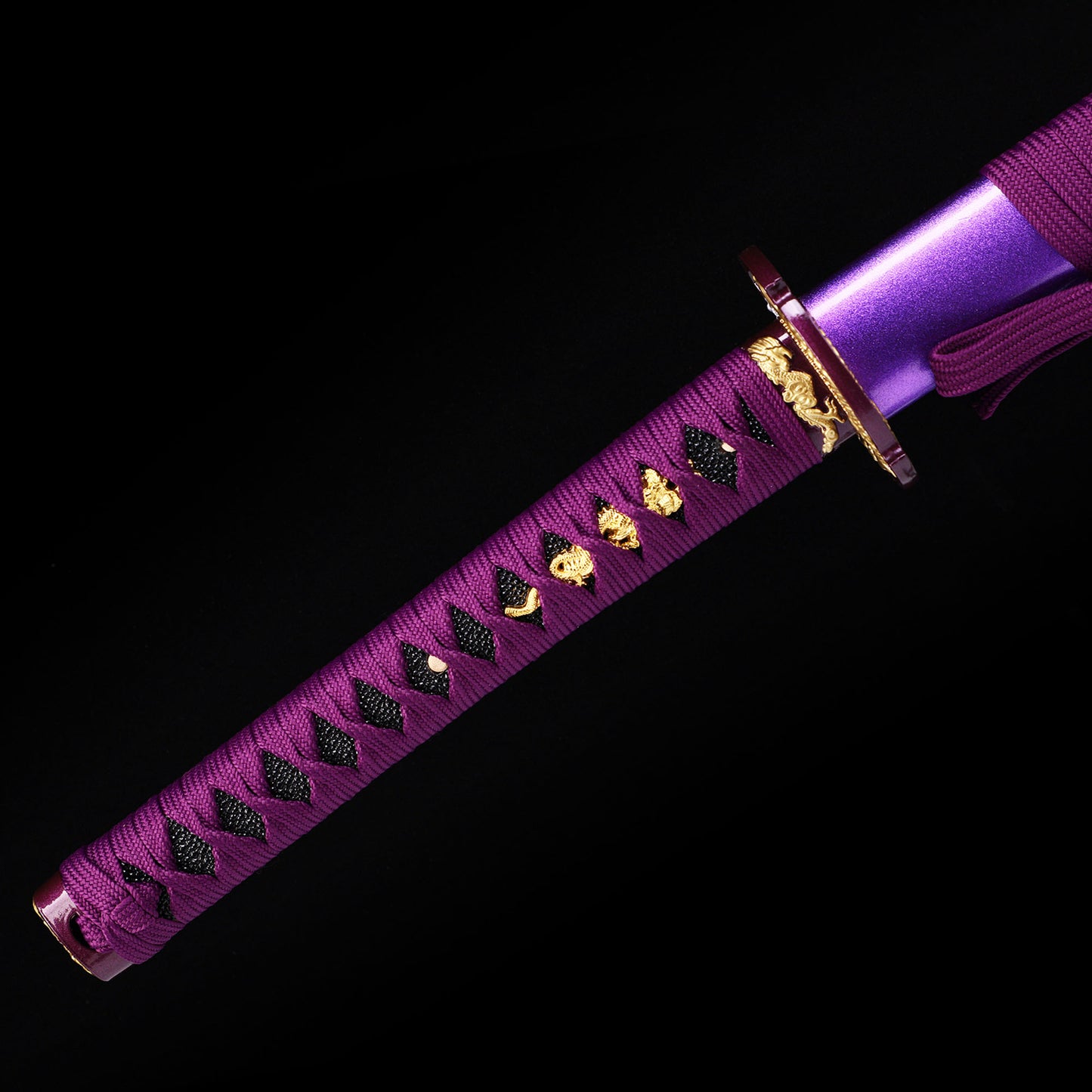 Purple Dragon katana handle close-up - purple tsuka wrap with dragon design