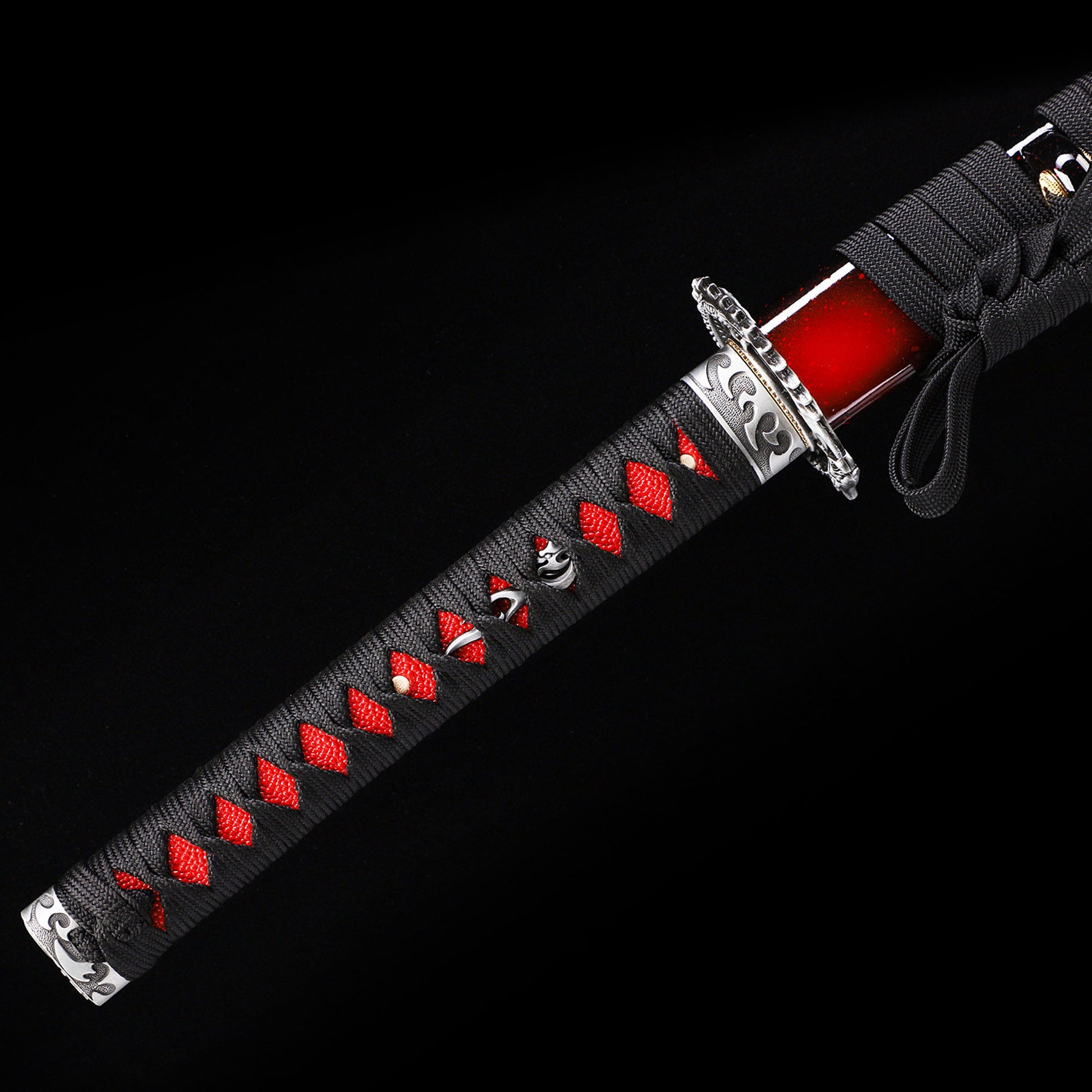 Dark Red Dragon katana handle close-up - red tsuka wrap with dragon design