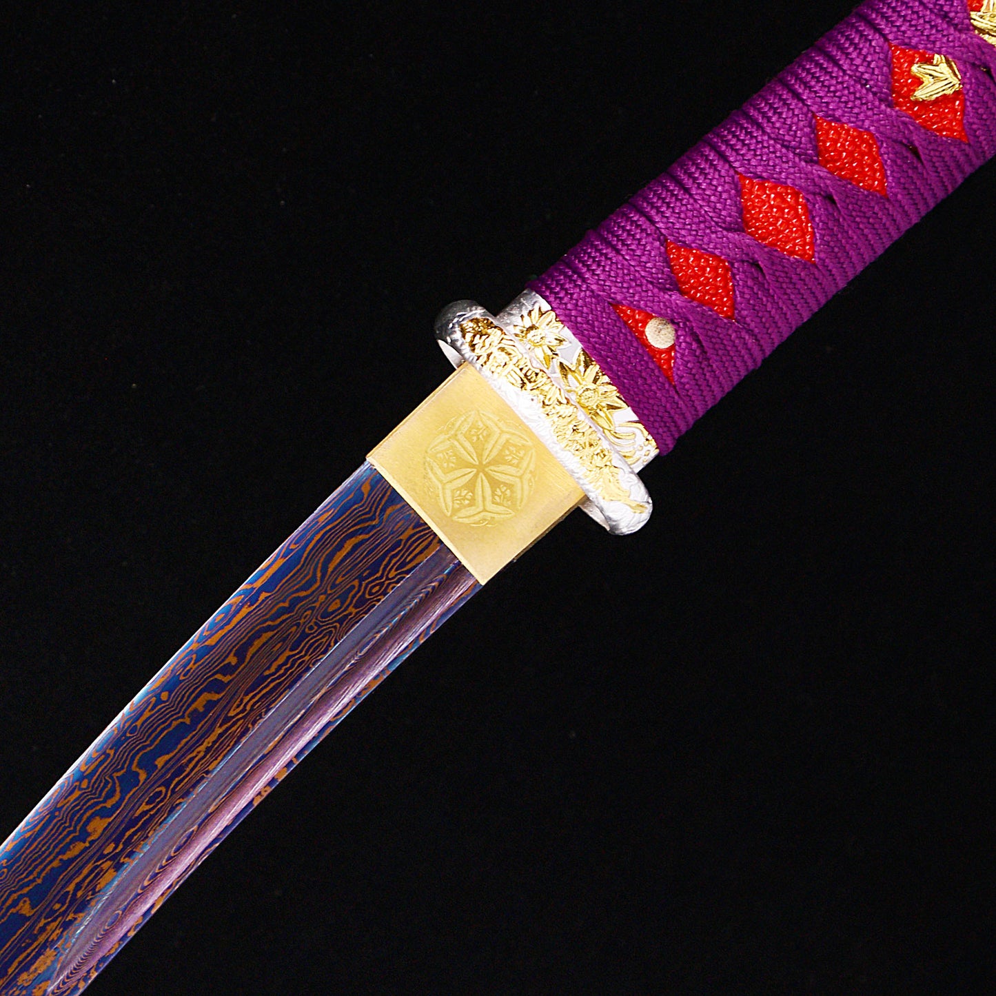 Purple marbled saya tanto blade close-up - razor sharp steel edge and hamon detail