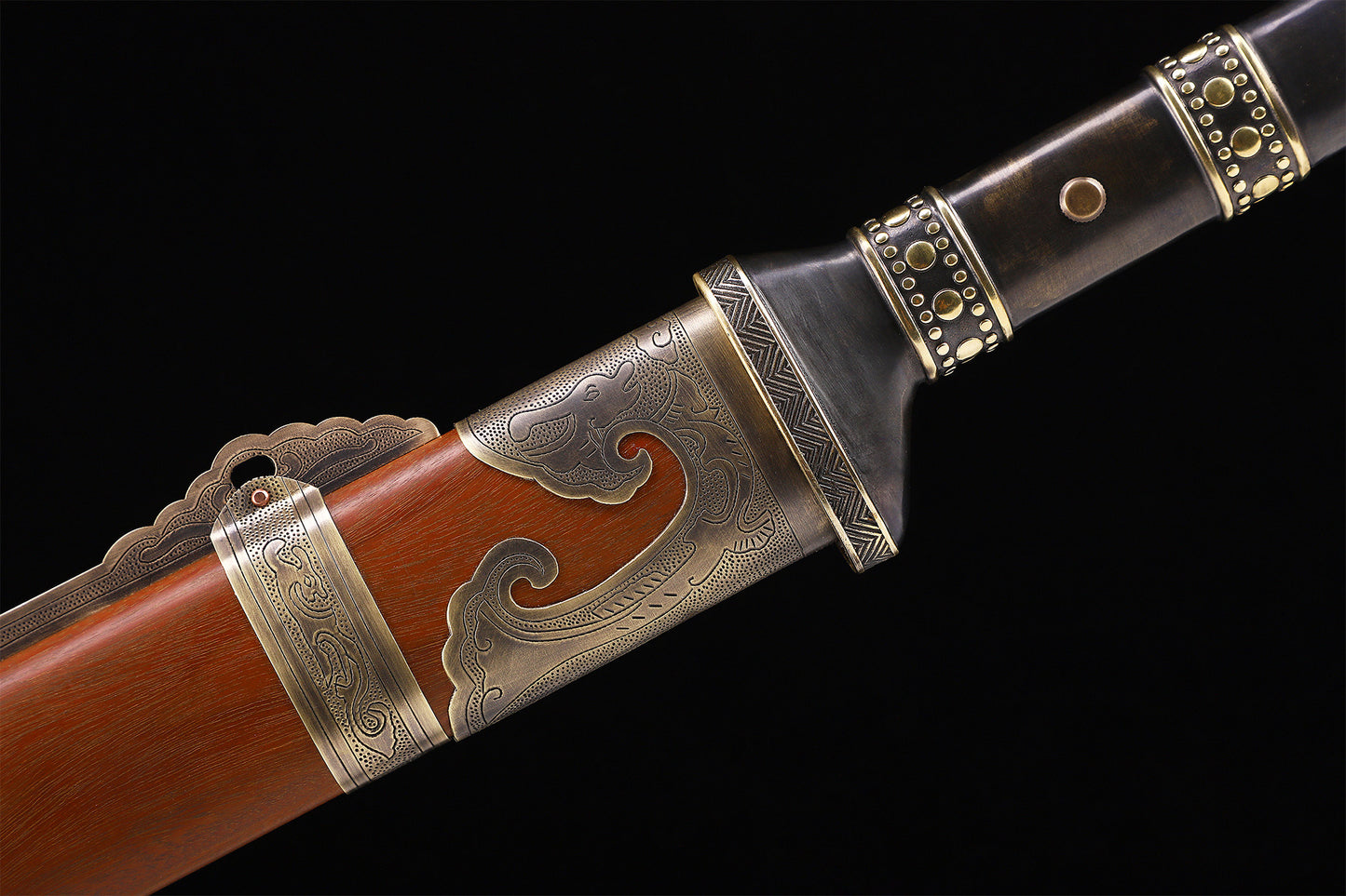 Dragon phoenix Chinese collectible sword copper fittings detail - cloud engraving close-up