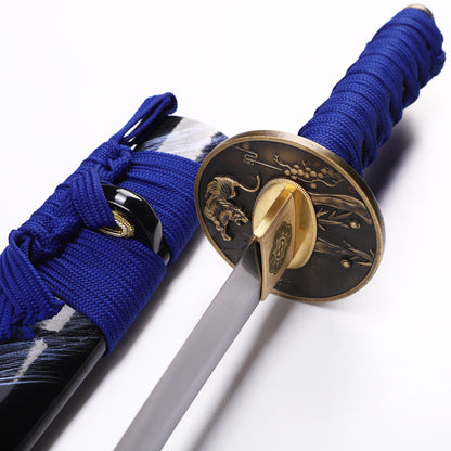 Blue handle black pattern tanto tsuba close-up - hand guard and habaki detail