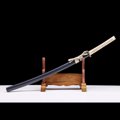 Beige wrapped handle katana angled view - blade curvature and natural tone saya