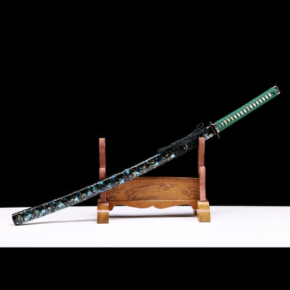 Green handle floral pattern samurai katana full length view