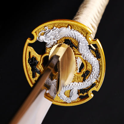 Golden Dragon katana tsuba guard detail - dragon motif hand guard close-up