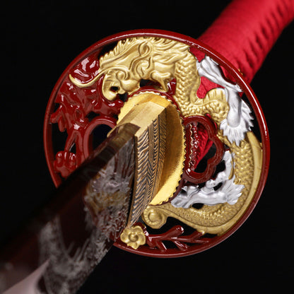 Red Dragon katana tsuba guard detail - dragon motif hand guard close-up