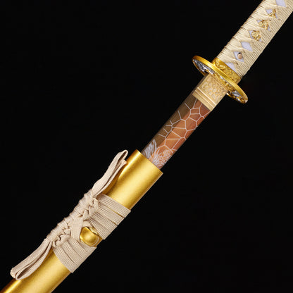 Golden Dragon katana blade close-up - razor sharp gold edge and hamon detail