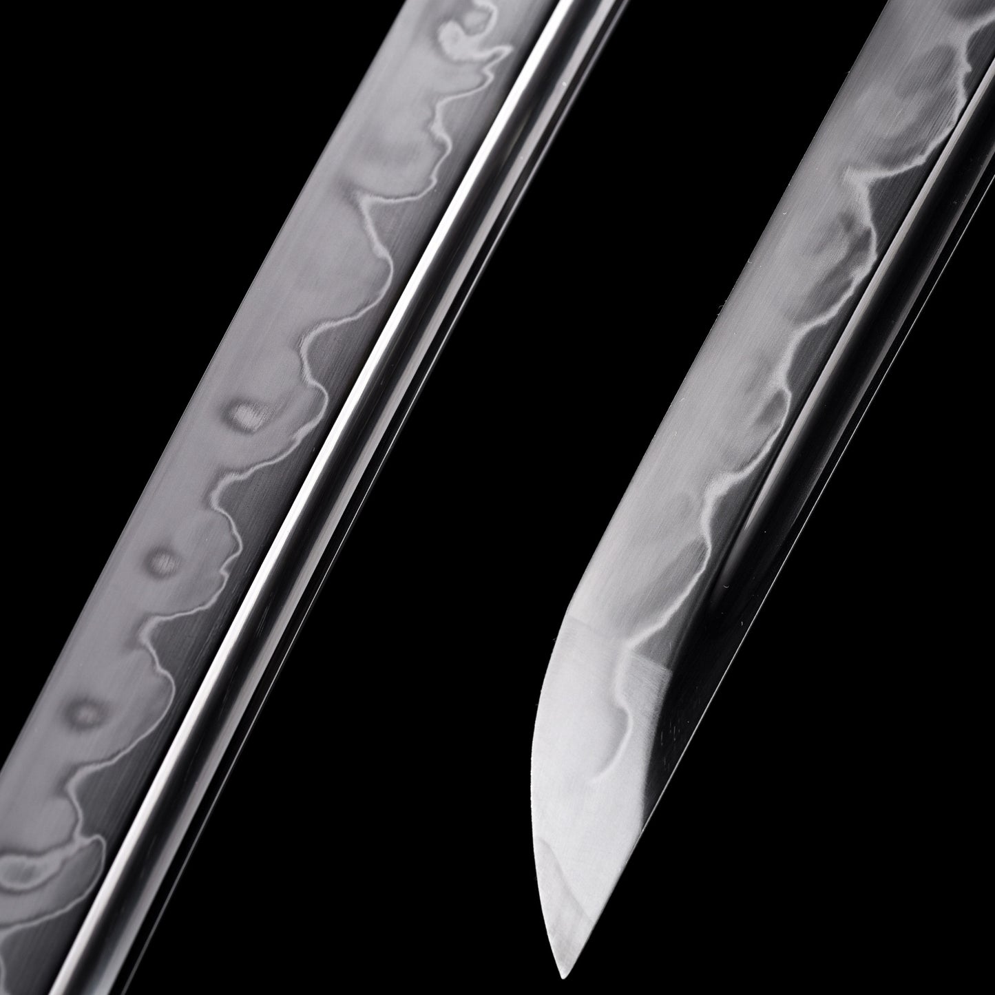 Katana sword tip detail - precision forged T10 steel kissaki point