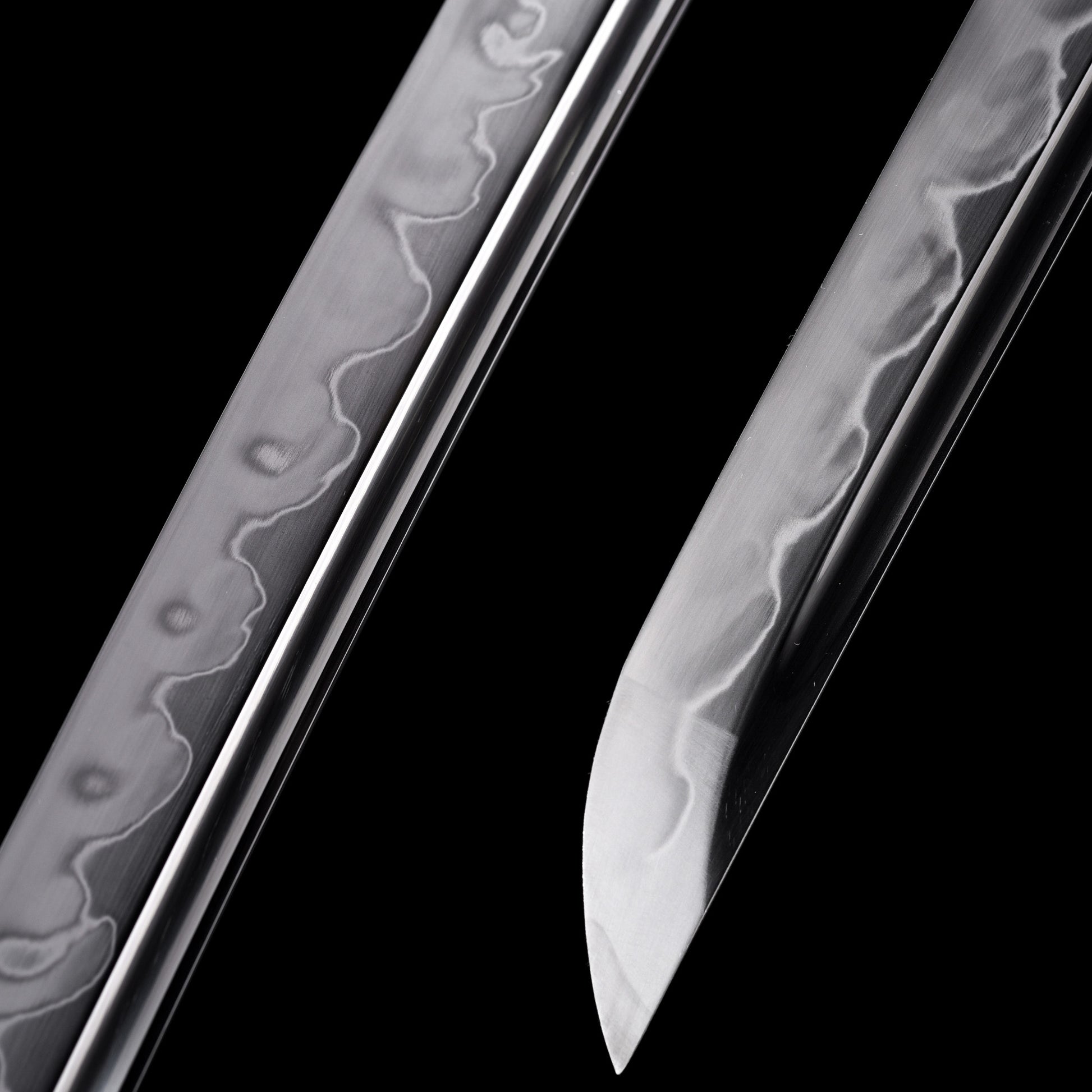 Katana sword tip detail - precision forged T10 steel kissaki point