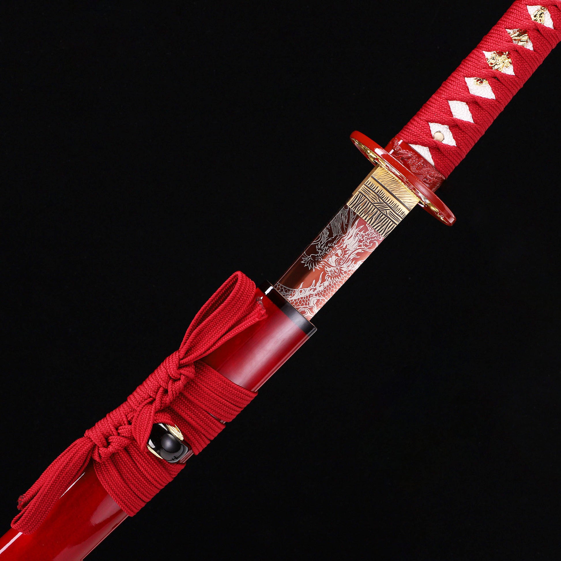 Red Dragon katana blade close-up - razor sharp red edge and hamon detail