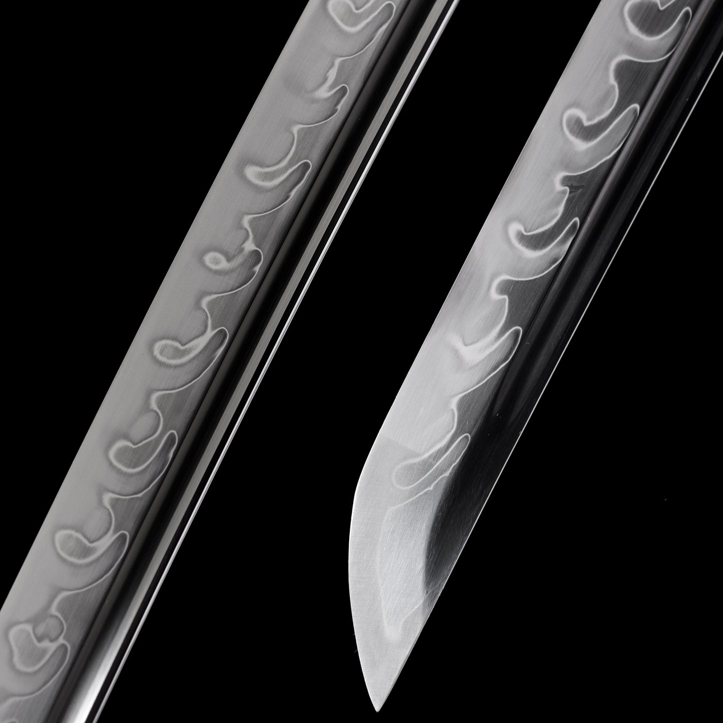 Katana sword tip detail - precision forged T10 steel kissaki point