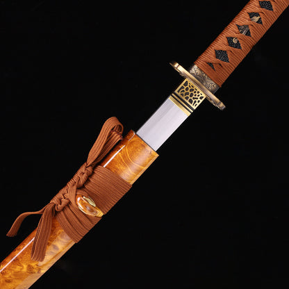 T10 steel katana blade close-up - razor sharp edge and clay tempered hamon detail
