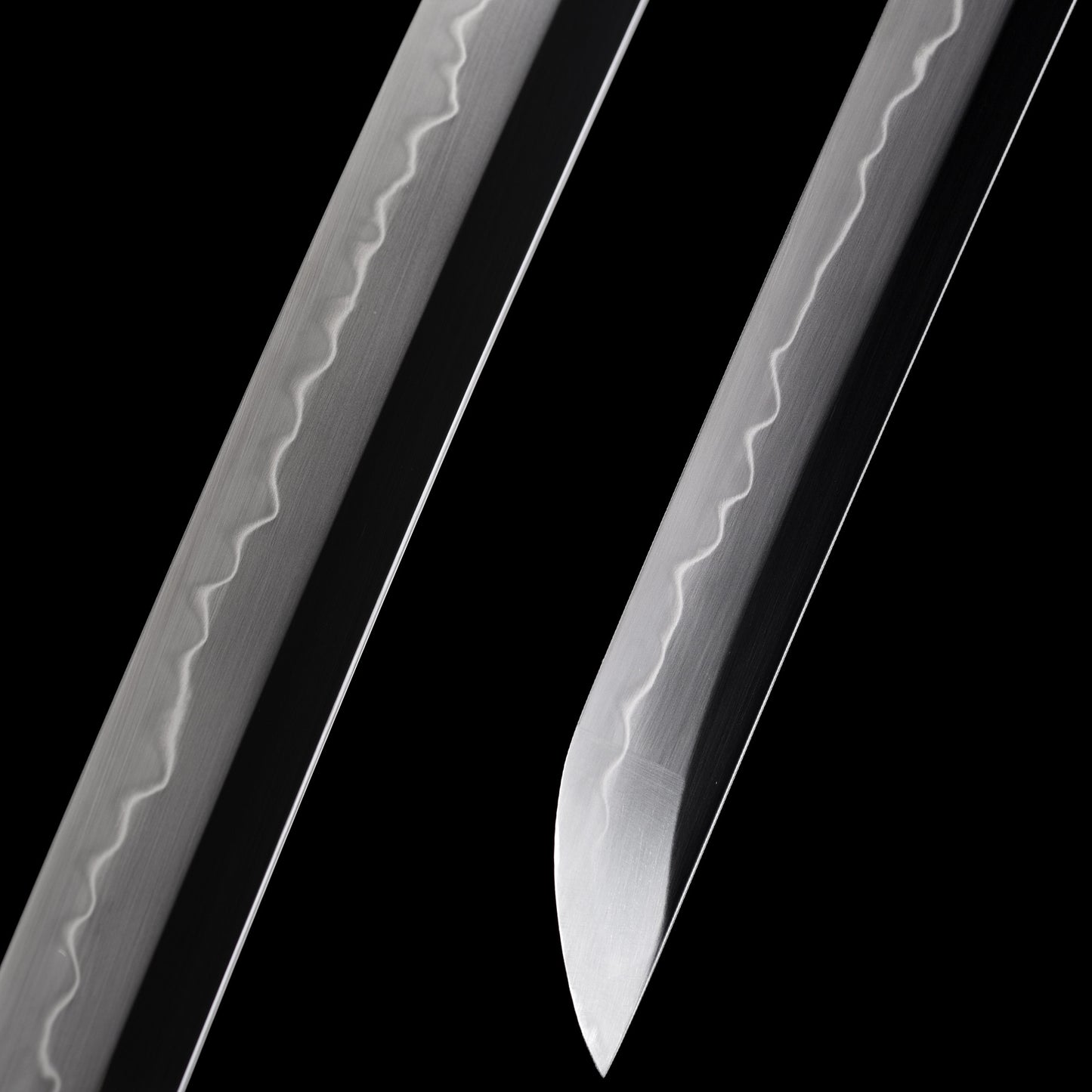 Katana sword tip detail - precision forged T10 steel kissaki point