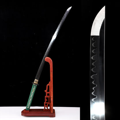 Green handle floral katana blade close-up - razor sharp steel edge and hamon detail