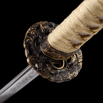 Katana sword tsuba guard detail - decorative hand guard close-up