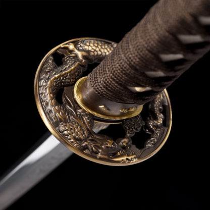 Katana sword tsuba guard detail - decorative hand guard close-up