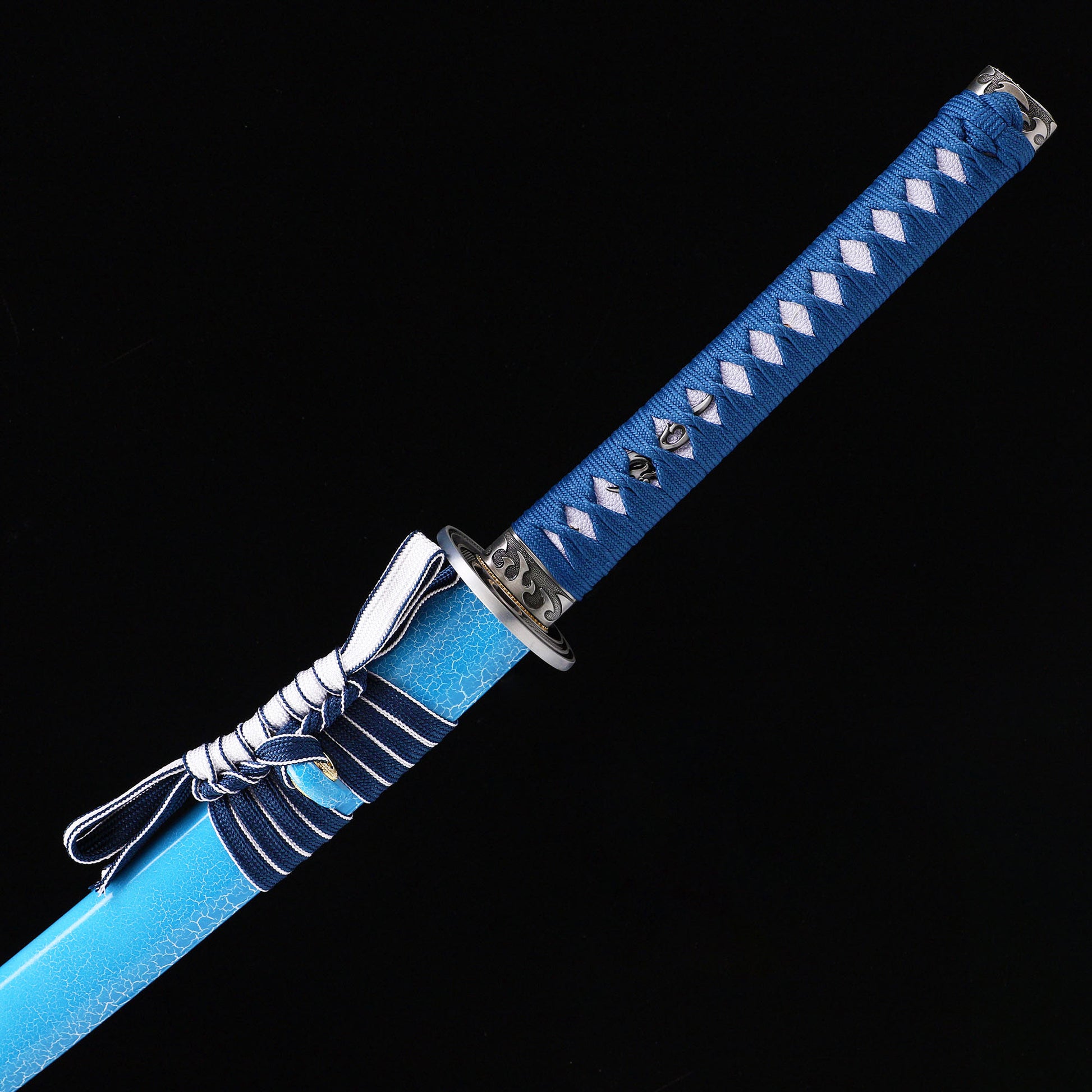 Light Blue Dragon katana handle close-up - light blue tsuka wrap with dragon design