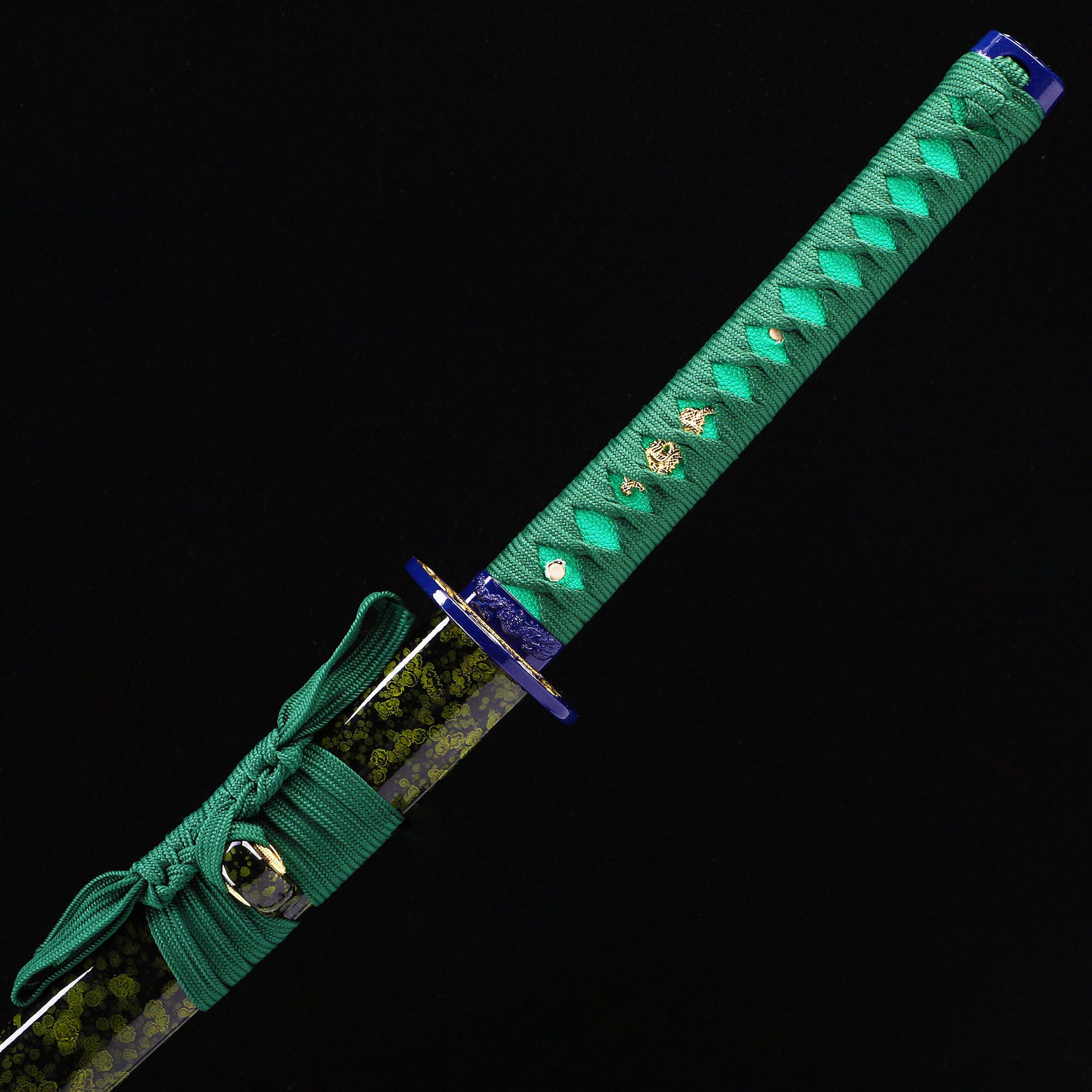 Blue Green Dragon katana handle close-up - teal tsuka wrap with dragon design