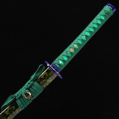 Blue Green Dragon katana handle close-up - teal tsuka wrap with dragon design