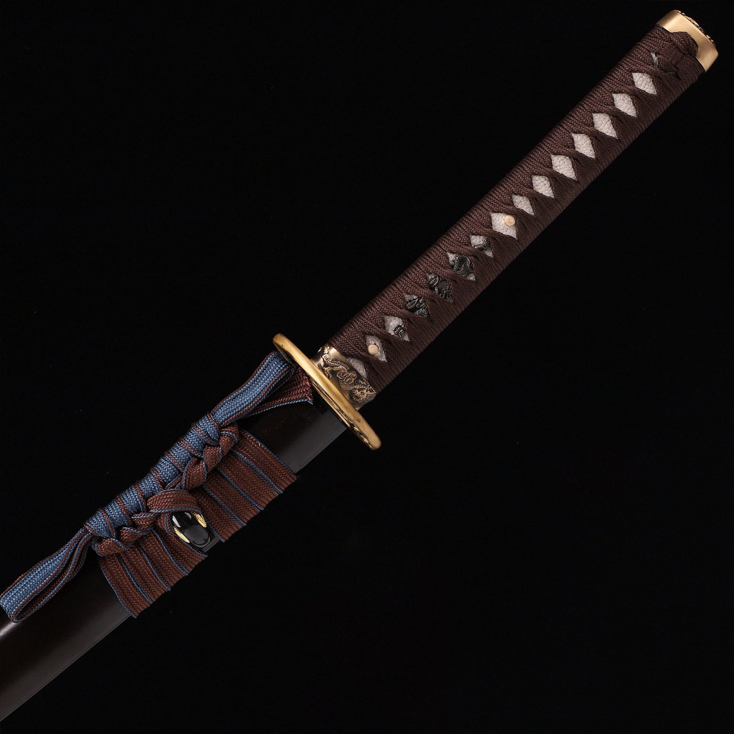 Katana sword handle close-up - traditional ray skin tsuka wrap full tang
