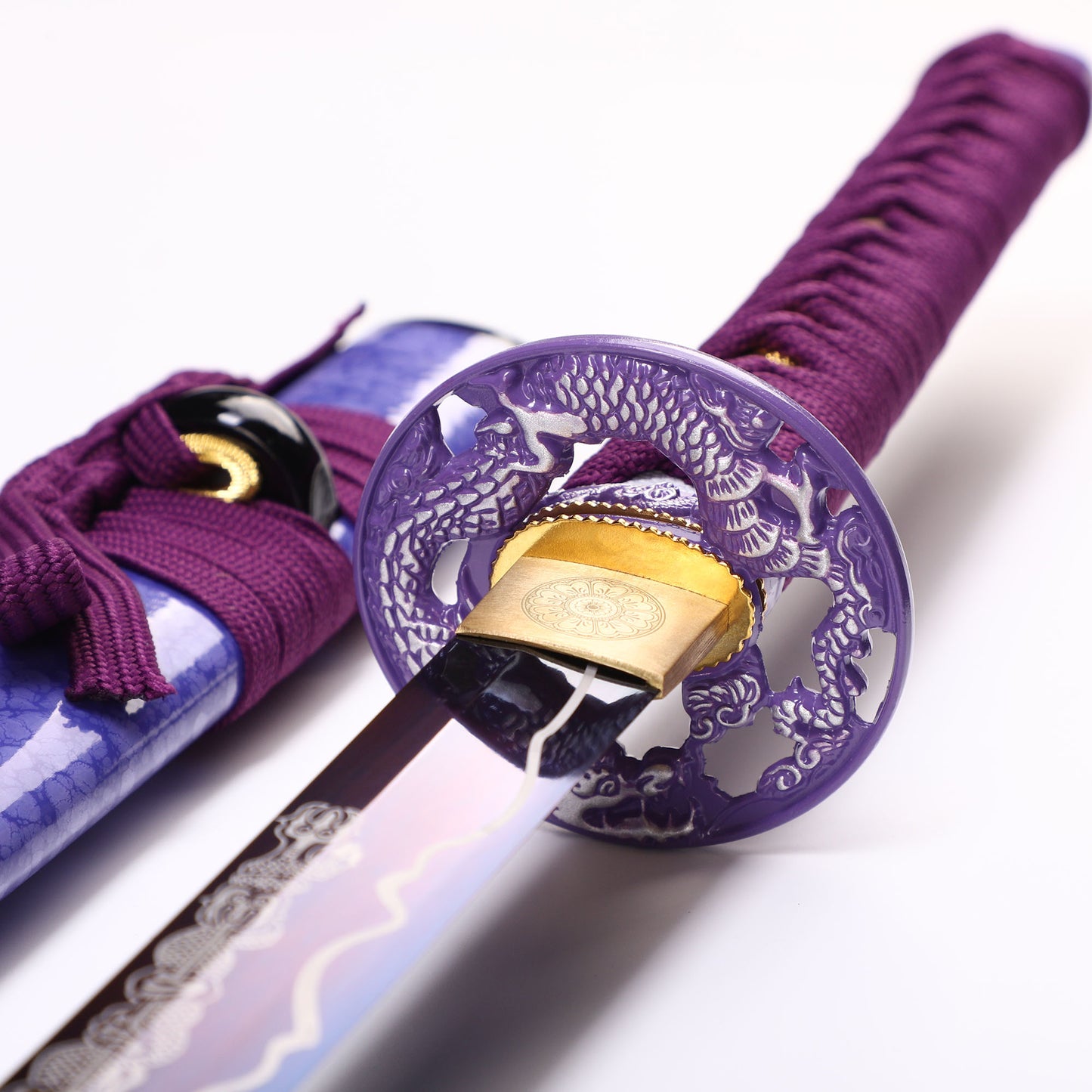 Purple Dragon katana tsuba guard detail - dragon motif hand guard close-up