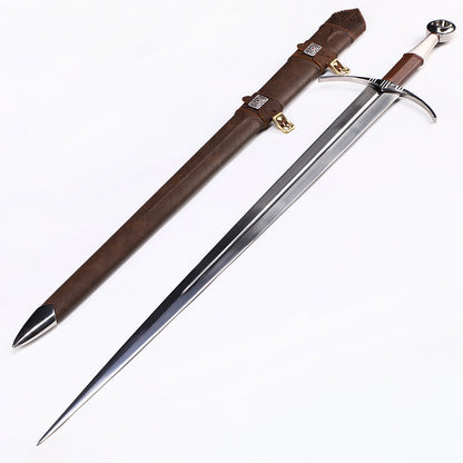 Medieval longsword angled view - blade curvature and fuller groove detail