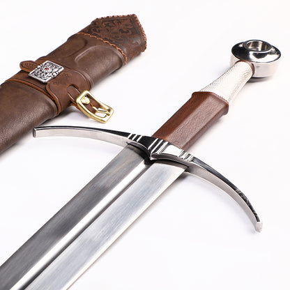 Medieval longsword fuller groove close-up - blade channel and edge geometry