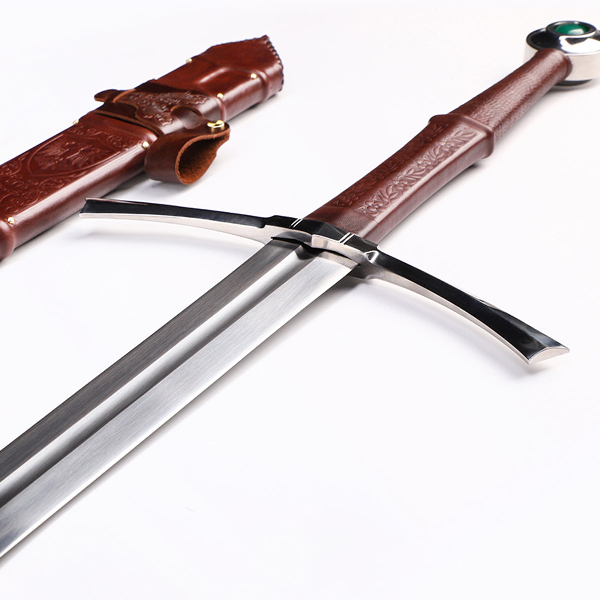Medieval longsword fuller groove close-up - blade channel and edge geometry detail