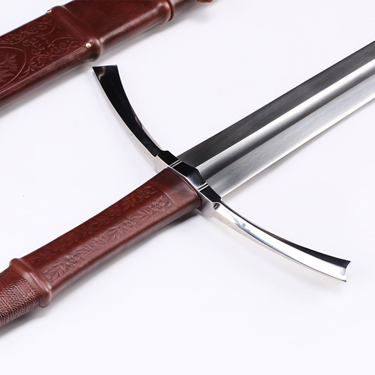 Medieval longsword grip close-up - two-handed handle construction and wrap detail