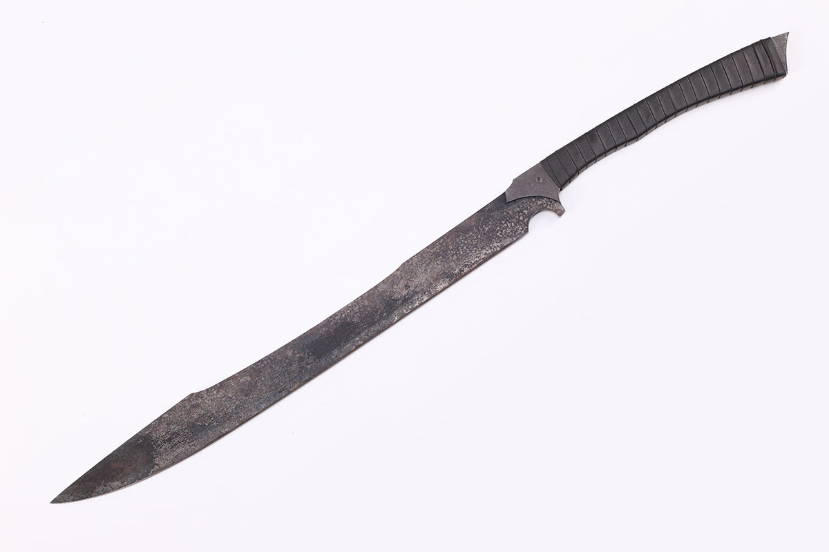 Tactical Shark Sword blade close-up - razor sharp serrated edge detail