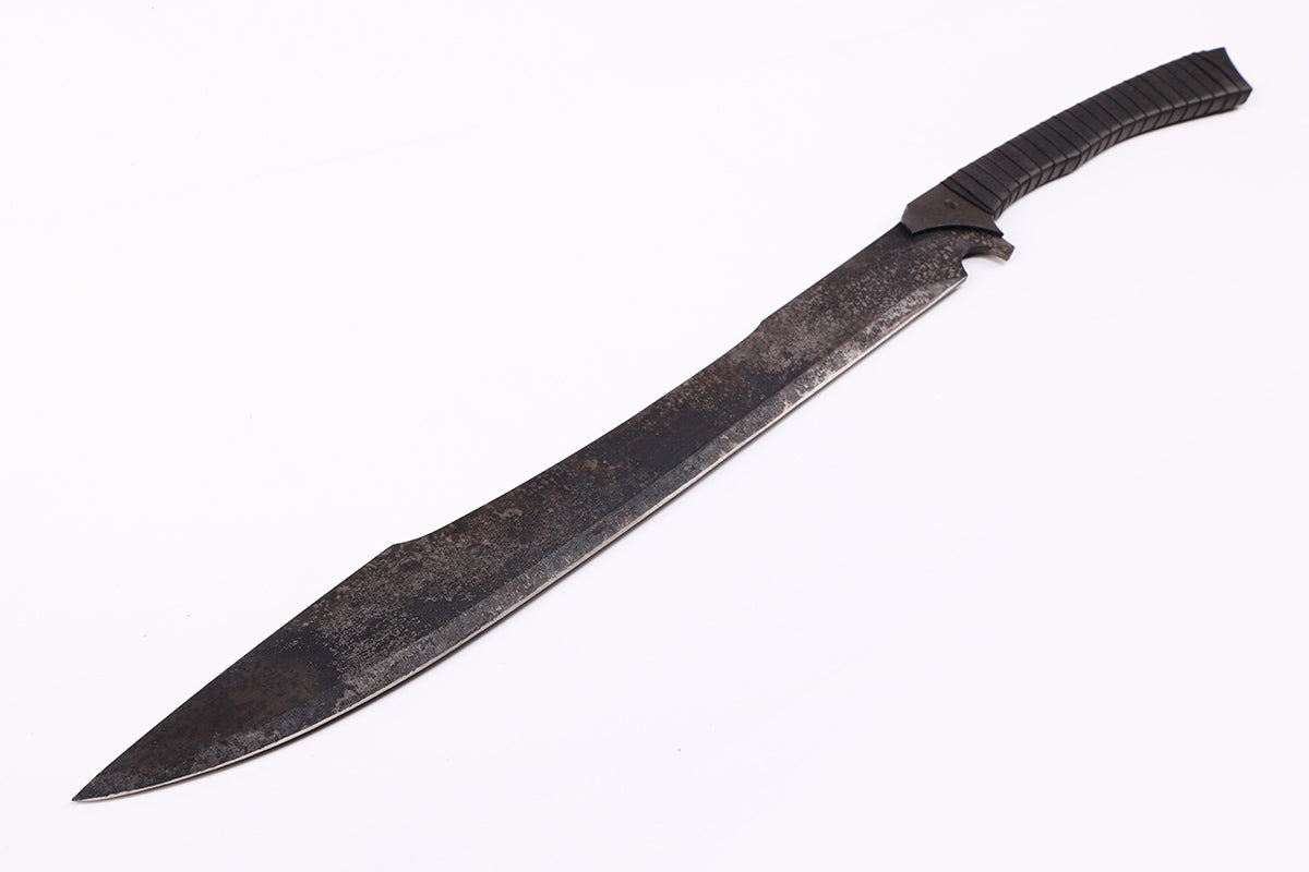 Tactical Shark Sword spine close-up - shark fin serration and blade thickness