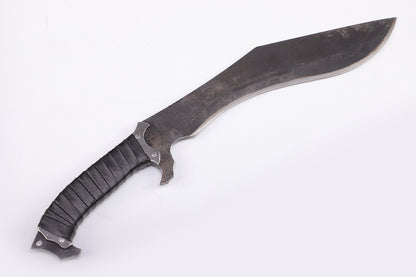 Nepalese curved kukri knife with wooden handle - Slant view with the tip of the knife facing upwards