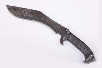 Nepalese curved kukri knife with wooden handle - Left angled view of the blade tip