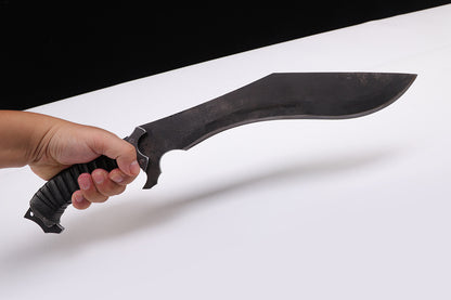 Nepalese curved kukri knife with wooden handle - Handheld image